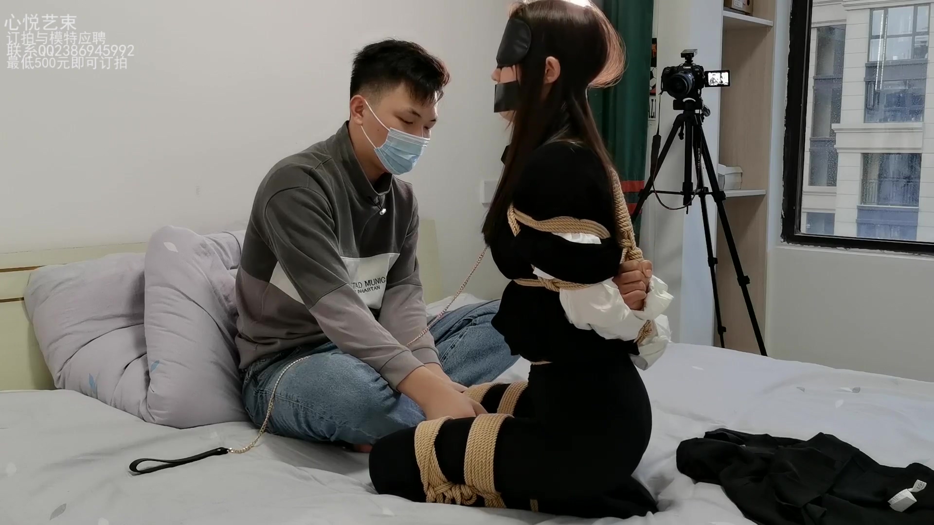 Asian Lady Blindfolded And Bound photo